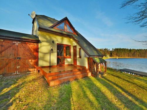 gmina Manowo Casa | Holiday house by the lake with a fireplace