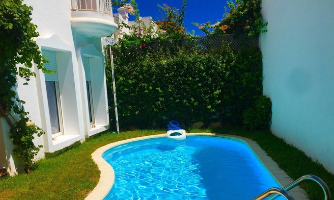 Tamariss Villa | Homerez - ¡A 200 m de la playa! Villa para 7 pers. con piscina, jardín y terraza