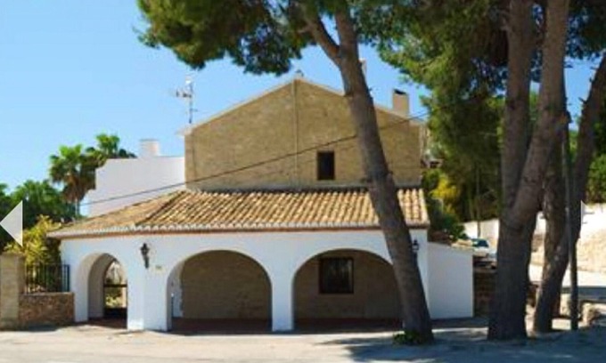 Paratella Apartamento | Homerez - Apartamento para 6 pers. con piscina y jardín en Benimarco
