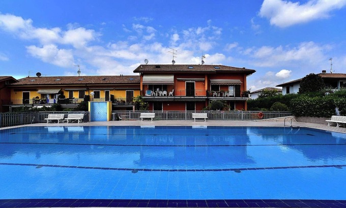 Pacengo Apartamento | Homerez - Apartamento en Pacengo, vista jardín