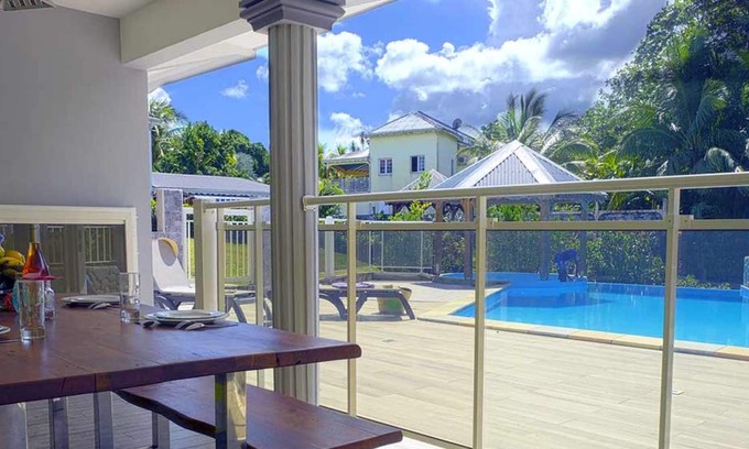 Lamentin Apartamento | Homerez - Apartamento a 10 km de la playa con piscina compartida y jacuzzi