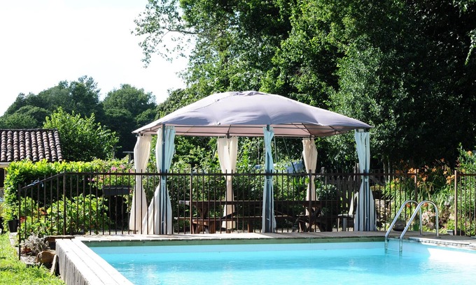 Lacam-d'Ourcet Villa | Homerez - Villa para 12 pers. con piscina y jardín en Sousceyrac En Quercy