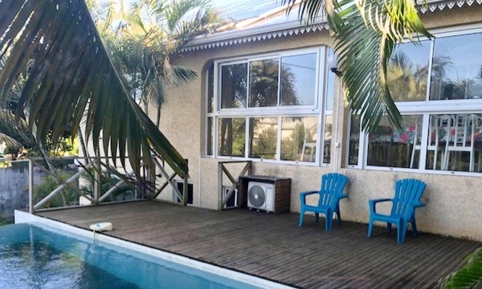 Manapany-les-Bains Casa | Homerez - Casa a 1 km de la playa para 20 pers. con piscina compartida y jacuzzi