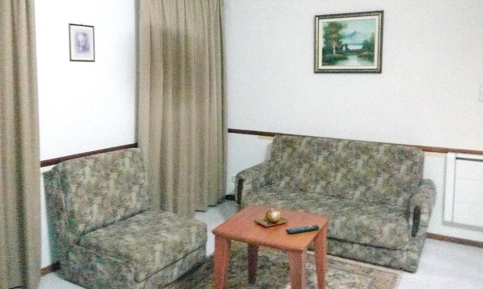 Alvoco da Serra Apartamento | Homerez - Bonito apartamento para 3 pers. con jardín en Alvoco da Serra