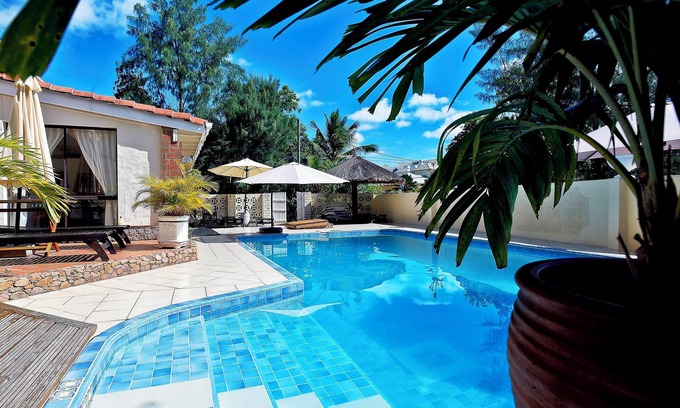 Glacis Casa | Homerez - Casa espaciosa con piscina compartida en Machabee