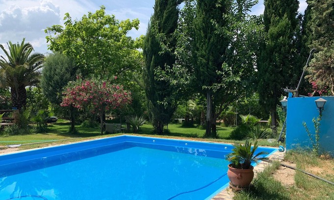 Mérida Villa | Homerez - Bonita villa para 5 pers. con piscina, jardín y terraza en Merida