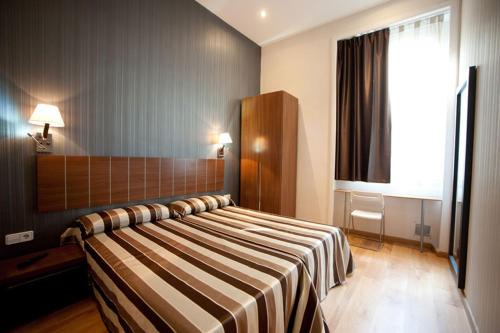Dreta de l'Eixample Casa | Hostal Bcn 46