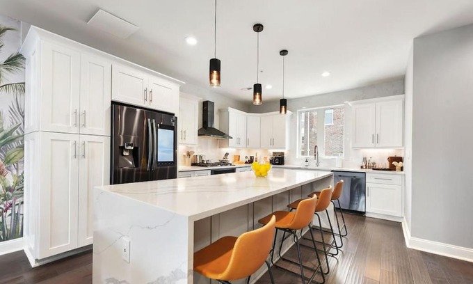 Lower Lawrenceville Casa | HostWise Stays - The Charlotte - Rooftop patio, Garage Parking, Prime Location, Large 3 Story Home