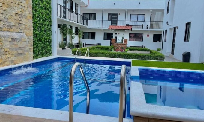 El Chiflon Hotel | HOTEL BUNGALOWS CASA BLANCA