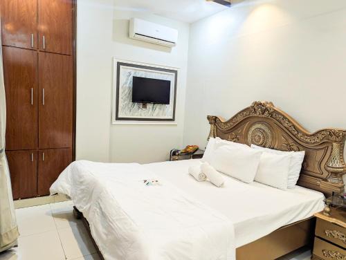 Gulshan-E-Jamal Cama Y Desayuno | Hotel StayInn - Millennium Mall Branch
