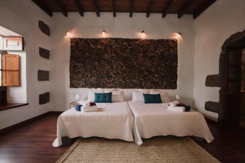 Tajaste Casa | Hotelito Rural Flor de Timanfaya
