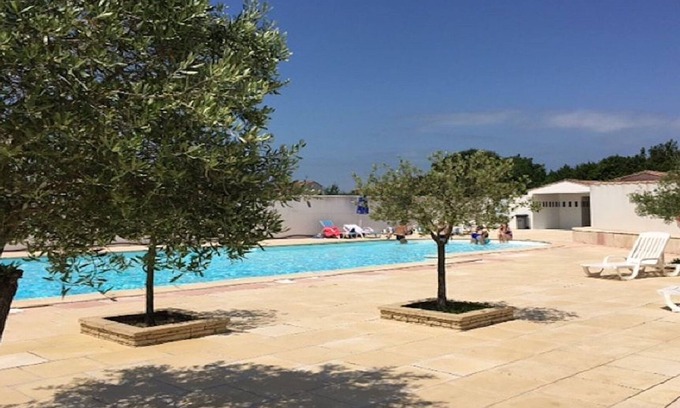 La Flotte Casa | Casa para 6 personas ubicada en La Flotte, piscina comunitaria, jardin