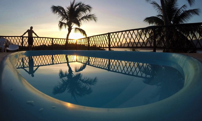 Portinho Casa | Casa con piscina, terraza y vistas panorámicas al mar y a la selva.