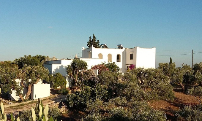 Cisternino Apartamento | 15% de descuento! Muy amplio apartamento para 8 personas. Piscina compartida y cancha de tenis