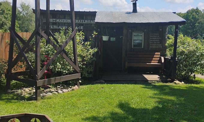 Frontier Cabina | Hunting Cabin Rustic Handcrafted primitive sits in our unique rustic Cowboy Town