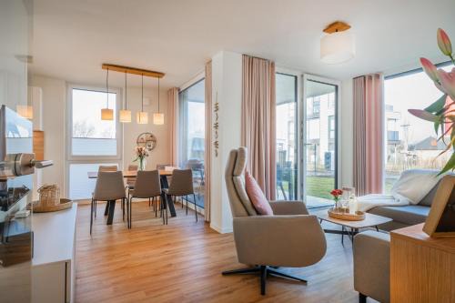 Marienleuchte Apartamento | Hygge – Familienfreundliche Ferienwohnung mit Garten & Meerblick