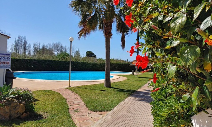 Molinell Chalet De Esquí | Ibiza-style vacation home with terrace right on the beach. Great pools.
