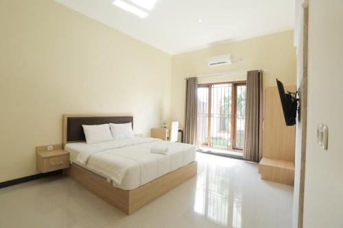 Banjarsari Casa | IDR Green Guest House Syariah Mitra RedDoorz