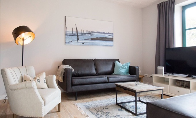 Dornum Apartamento | "Idyllic vacation apartment in Neßmersiel - your retreat on the coast!"