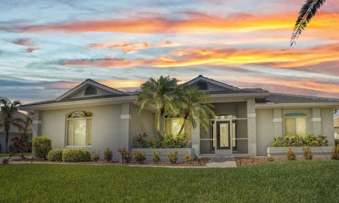 Burnt Store Isles Casa | INCREDIBLE WATER VIEW!! NEW LUXURY REMODELED HOME; HEATED SALT POOL, GOLF NEARBY