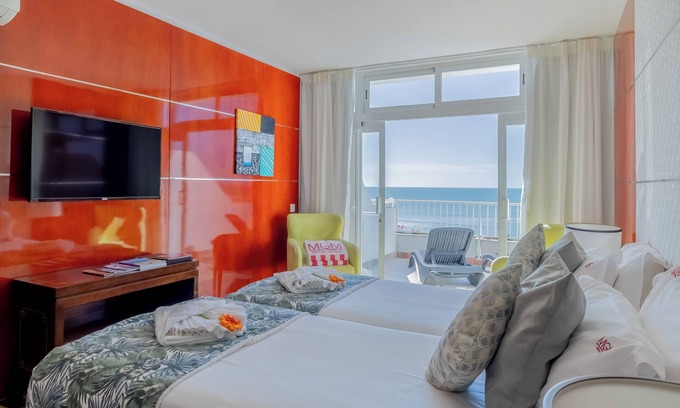 Oura Hotel | Indulge in Home-Like Comfort! Three Relaxing Suites, Pool, Beachfront Property!