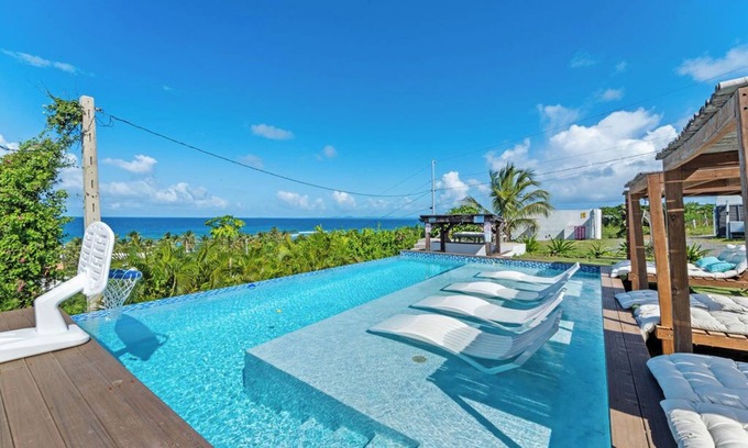 Villa Borinquen Casa | Private infinity pool , ocean view, walk to beach, 5BR house