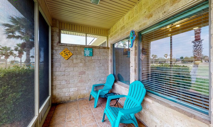 Laguna Vista Condominio | Inviting dog-friendly getaway with screened sunroom, pool, pickleball, & tennis