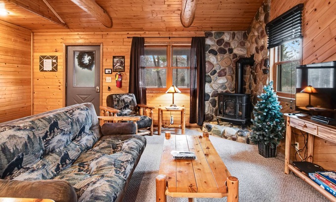 New Lisbon Cabina | Inviting dog-friendly cabin with hammock, fireplace, shared fishing pond, & A/C