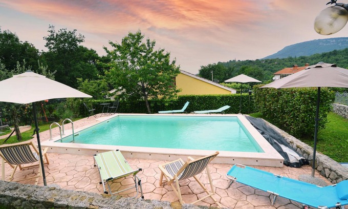 Rim Casa | Inviting vacation home with pool and traditional flair.