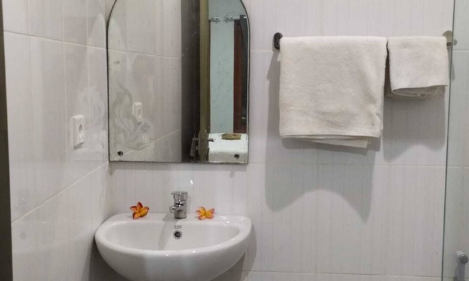 Taman Griya Casa | Iona kos kosan habitaciones impecables y alojamiento familiar de lujo
