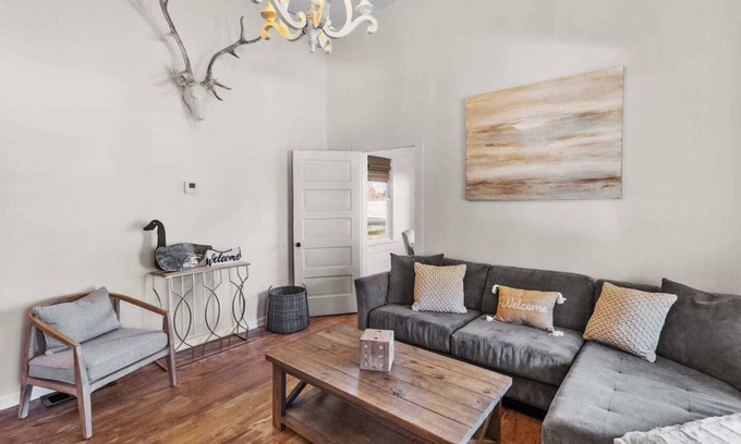 Mooringsport Casa | Southern Magnolia House with porch swing and rocking chairs