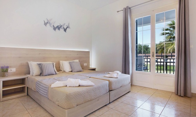 Alykes Apartamento | JHoliday Apartamento "Tropical 1" con jardín compartido, aire acondicionado y Wi-Fi