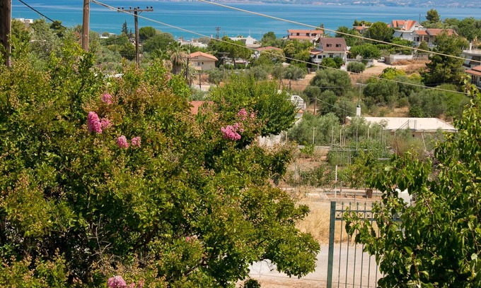 Dilesi Casa | La casa de joanna Hermosa casa de verano con vista al mar