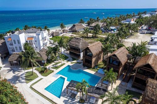 Puerto Morelos Hotel | Kabañas & Beach Club Ojo de Agua