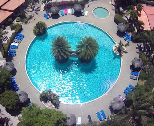 Willemstad Apartamento | Kas di BaMi A-194 op Seru Coral Resort - Ruim appartement met groot zwembad en tropische tuin