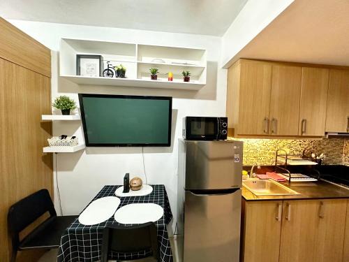 Barangay 76 Apartamento | Kathys Crib with balcony Pool view at Shell Residence