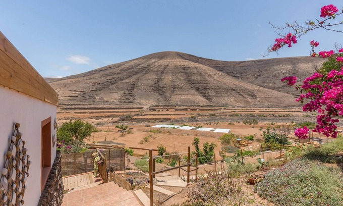 Guisguey Apartamento | Casa de vacaciones Kikiki House Vista Jardín La 5 con vistas a la montaña, piscina y Wi-Fi