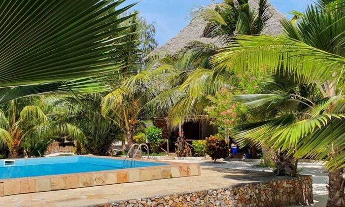 Pongwe Apartamento | Kimurimuri - villa privada aislada con piscina directamente en la playa