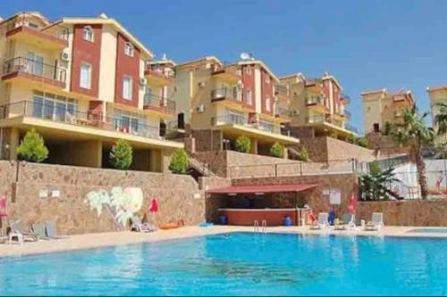 Kadnlar Denizi Mahallesi Casa | Kismideniz manzarali havuzlu daire