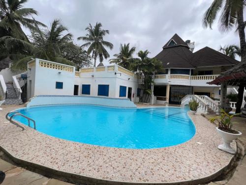Galu Casa | Kivuli villas Diani ,located 2 minutes walk to the White sandy Diani Beach