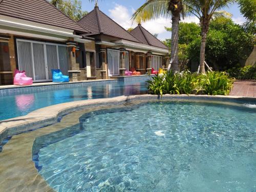 Gianyar Casa | Kori Maharani Villas - Lagoon Pool Access 6