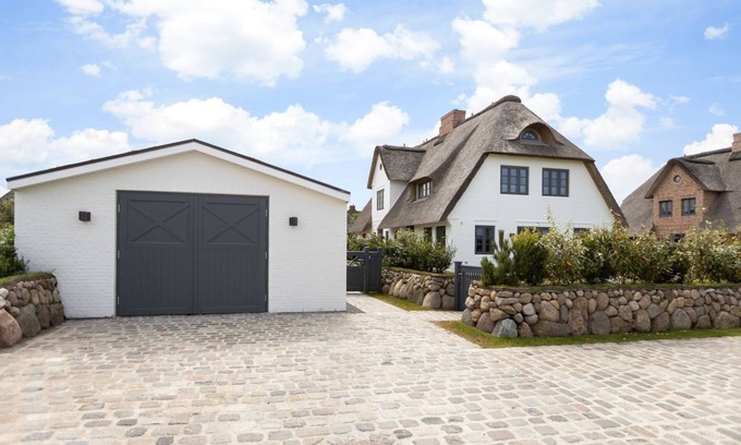Sylt Casa | Löwenherz - Reetdach-hausteil mit ca. 159 m² im Erd-/ober-/dach und Untergeschoss
