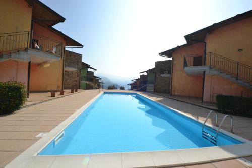 Tavernola Apartamento | La casa di Gabry in residence con piscina comune