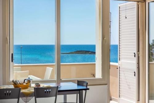 Torre San Giovanni Apartamento | LA CASA DI CLAUDIA "attico con strepitosa vista mare 4 posti letto"