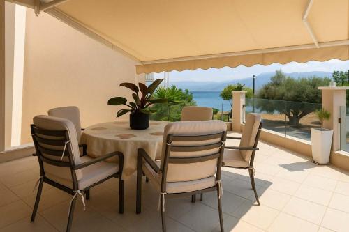 Marathias Casa | La Casa Rosa Seaside Getaway