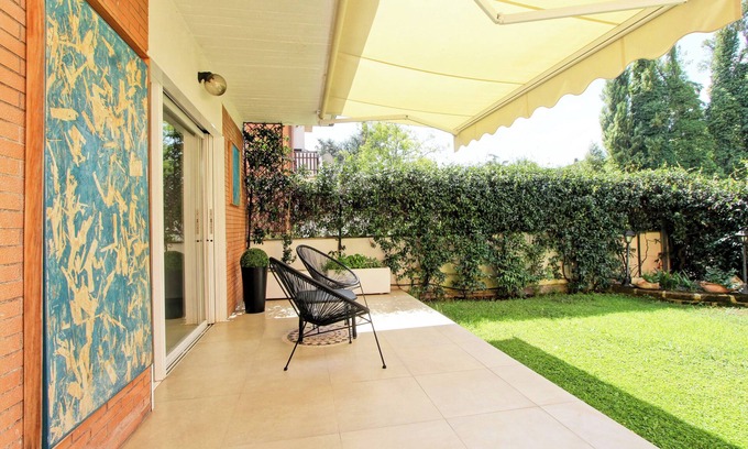 Zona XXVIII Tor de' Cenci Apartamento | La Casina di Tre Pini – Jardín y Aparcamiento