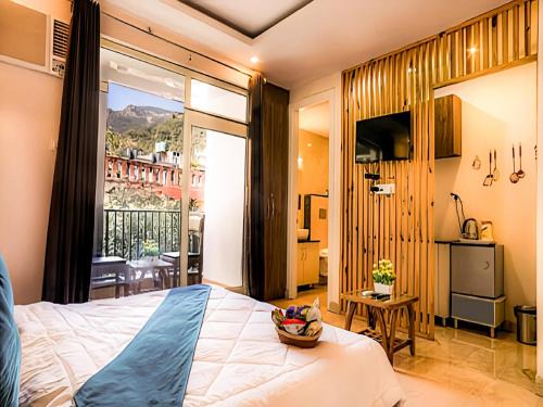 Tapovan Hotel | LA Riqueza Pride Inn # Close to Lakshman Jhula & Ganga Ghat # Rooftop Swimming Pool with Mountain View # Free Parking