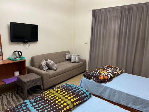 Zafarana Hotel | La sirena double room with mountain view, Families and couples only, Extra of 180 Egyptian pounds per adult person per stay ,to be paid to the resort