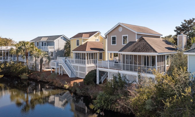 Pelican Bay Casa | Lagoon view, screen porch w/ swing bed, Pool, near beach - 3 Pelican Bay