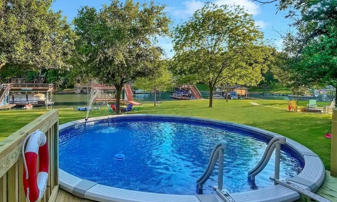 Cedar Creek Reservoir Casa | Lake Front Oasis, Pool, Dock, Fire Pit, Sleeps 10
